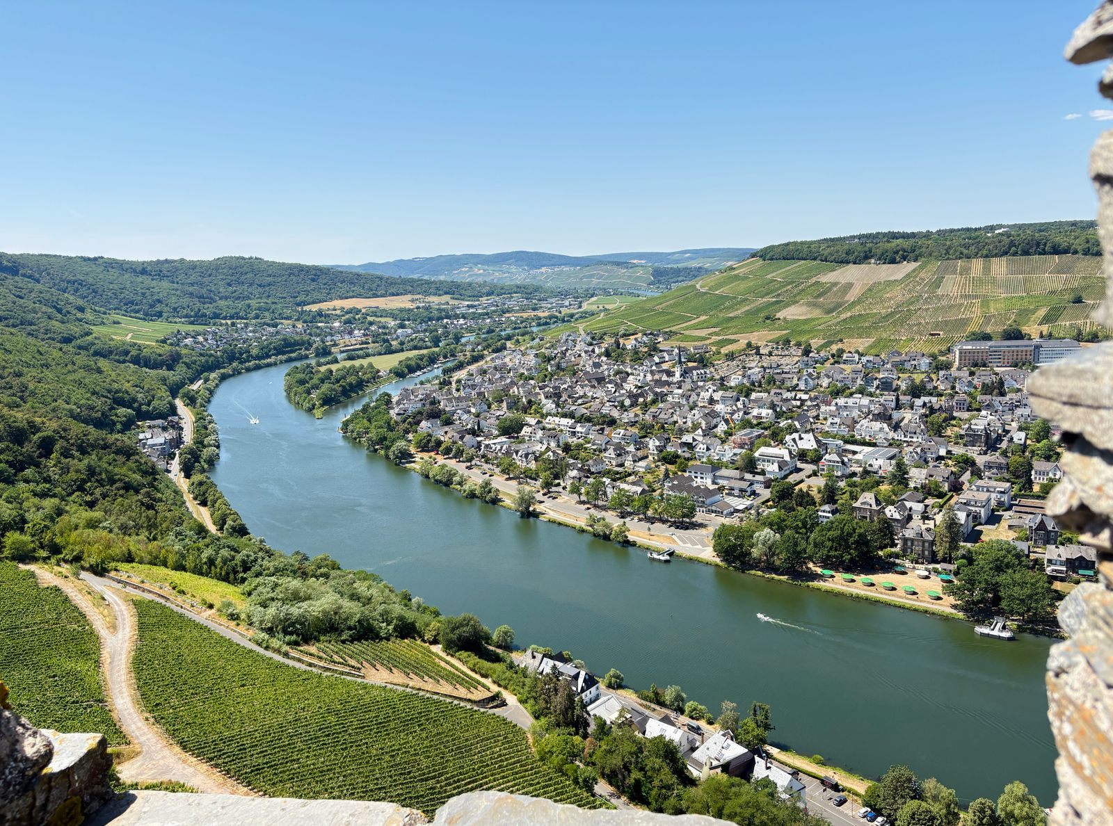 Aerial view of the Moselle curving past Bernkastel-Kues and steep vineyards, a short, scenic route among the best cheap river cruises